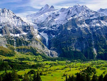 The lush valleys and snow-capped peaks of Grindelwald, Switzerland