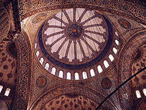 The beautiful paintings inside the dome of the Blue Mosque in Istanbul
