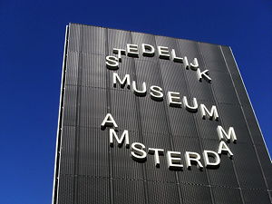 The museum logo on the building exterior
