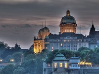 The Bundeshaus from the Aare after a storm (© Peter Gronemann, CCA 2.0 Generic).