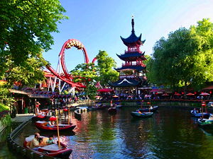 Dragon Boat lake and Dæmonen roller coaster in the background at the Tivoli in Copenhagen