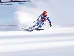 A giant slalom skiier competing at the Ski World Cup Race at Lauberhorn