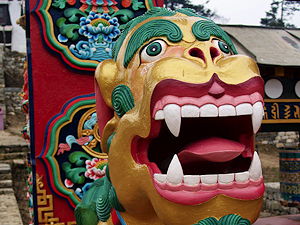 A statue of a deity at the entrance