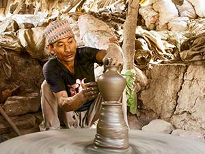 A potter at work in Potters' Square