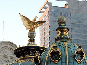 A gilded eagle sculpture atop the dome