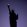 The Liberty Statue's silhouette at night.